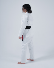Kingz Born to Rule Women's Jiu Jitsu Gi White - Side View Female Athlete Embroidered Back Text Black Belt Contrast Clean Design Durable Fabric BJJ Gi Training [color:White]