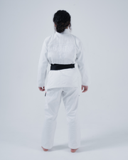 Kingz Born to Rule Women's Jiu Jitsu Gi White - Back View Female Athlete Embroidered "Born to Rule" Text Back Black Belt Contrast Clean Design Durable Fabric BJJ Gi Training [color:White]
