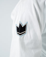 Kingz Nano 3.0 BJJ Gi White sleeve closeup showing black crown logo patch on lightweight pearl weave