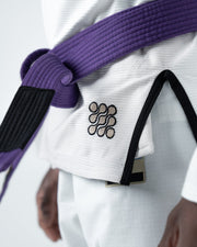 Kingz Nano 3.0 BJJ Gi White skirt closeup showing dotted Nano logo embroidery and purple belt