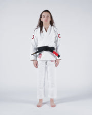 Kingz Classic 3.0 Women's BJJ Gi White - Full Body Front View Female Athlete Black Belt Red Crown Badge Logos Both Sleeves