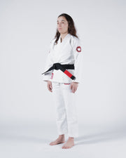 Kingz Classic 3.0 Women's BJJ Gi White - Full Body Angled Front View Female Athlete Black Belt Red Crown Badge Logo Women's