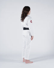 Kingz Classic 3.0 Women's BJJ Gi White - Full Body Side Profile Right View Female Athlete Black Belt Red Crown Logo Women's Slim