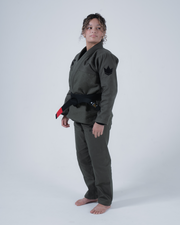 Kingz Born to Rule Women's Jiu Jitsu Gi Military Green - Full Body Front View Female Athlete Black Crown Badge Shoulder Black Belt Tailored Fit Durable Fabric BJJ Gi [color:Military Green]