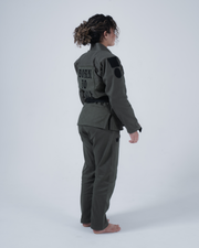 Kingz Born to Rule Women's Jiu Jitsu Gi Military Green - Back View Female Athlete Black "Born to Rule" Text Back Patch Black Belt Crown Badge Right Thigh Durable Fabric BJJ Gi Training [color:Military Green]