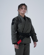 Kingz Born to Rule Women's Jiu Jitsu Gi Military Green - Front View Female Athlete Black Shoulder Logo Black Belt Red Tab Quilted Texture Durable Fabric BJJ Training Gi [color:Military Green]