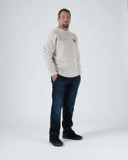 Kingz Jiu Jitsu Club Crewneck - Full Length Casual Pose - Hand in Pocket Stance - Latte - Men's BJJ Crewneck