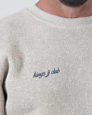 Kingz Jiu Jitsu Club Crewneck - Chest Script Close Up - Blue Kingz JJ Club Embroidery - Latte - BJJ Crewneck