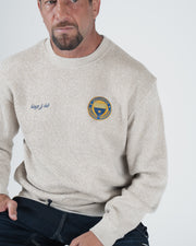 Kingz Jiu Jitsu Club Crewneck - Front Torso Close Up - Crest Badge and Blue Script - Latte - Men's BJJ Crewneck