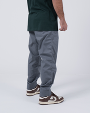 Kingz Casual Rip Stop Gi Pant Grey - Side View Male Athlete Grey Rip Stop Fabric Elastic Cuffed Ankles Relaxed Fit BJJ Gi Training Apparel [color:Grey]