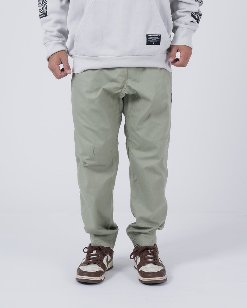 Kingz Casual Rip Stop Gi Pant Stone Green - Front View Male Athlete Sage Tone Durable Ripstop Fabric Relaxed Fit Elastic Ankles Minimalist Design BJJ Gi Training Apparel [color:Stone Green]