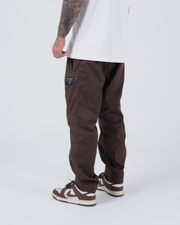 Kingz Casual Rip Stop Gi Pant - Brown - Back View Male Athlete Earthy Brown Rip Stop Fabric Black Label Right Thigh Relaxed Fit BJJ Gi Training [color:Earthy brown]