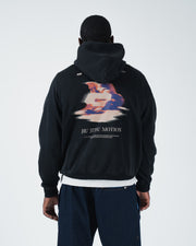 Black BJJ hoodie front studio shot on adult male model showing pigment washed fabric and mid-weight fleece