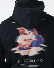 Black BJJ hoodie back graphic closeup detail of blurred motion artwork and Jiu Jitsu Motion lettering