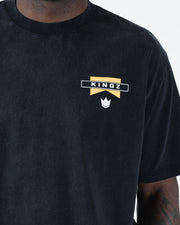 Kingz Flag Tee - Chest Logo Close-Up - KINGZ Yellow Flag Crown Chest Patch - Black BJJ Premium T-Shirt
