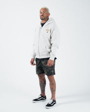 Grey BJJ zip up hoodie full length angled front shot with adult male model showing casual camo styling