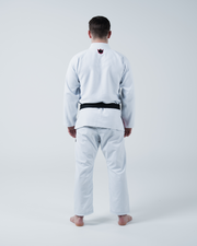 Kingz Ultralight 2.0 BJJ Gi White - Full Back View Male Athlete Standing Wearing White Gi Jacket and Pants Crown Logo Back Collar Barefoot