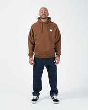 Chestnut brown BJJ hoodie full length front lifestyle shot with adult male model standing in jeans
