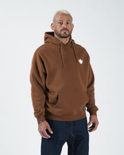 Chestnut brown BJJ hoodie relaxed front pose on adult male model with crown logo and kangaroo pocket
