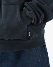 Black BJJ zip up hoodie hem detail closeup showing side pocket Kingz label tag and ribbed pigment wash hem