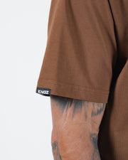 Kingz Kore V2 Tee - Sleeve Fabric Detail - KINGZ Woven Label Brown Cotton Texture - BJJ Premium Tee