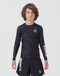 Kingz Kore V2 Youth L/S Rashguard Navy Black - Full Body Front View Teen Boy Athlete Long Sleeve Navy Blue Minimal Design White Crown Logo Circle Chest KINGZ White Sleeve Text Matching Navy Shorts Kids BJJ Training [color:Black]