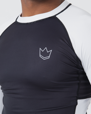 Kingz Ranked Performance V2 L/S Rashguard Navy White - Close Up Chest Logo Detail White Crown Logo Chest Navy Body White Raglan Sleeves White Neck Collar Mesh Panel Texture Performance Fit BJJ Competition Guard