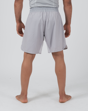 Kingz Ghost Grappling Shorts Silver Gray - Full Body Back View Male Athlete Light Silver Gray All-Gray Clean Back Design Side Splits Competition Cut Men's Grappling Shorts No-Gi BJJ
