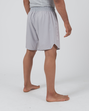 Kingz Ghost Grappling Shorts Silver Gray - Full Body Back View Second Angle Male Athlete Light Silver Gray All-Gray Clean Design Side Splits Competition Cut Men's Grappling Shorts No-Gi BJJ