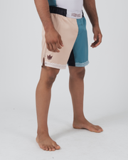 Kingz Flow Performance Series Shorts Blue Cream - Full Body Left Side Profile Male Athlete Cream Beige Front Panel Teal Blue Back Side Panel Crown Logo Left Thigh Wavy Hem Trim Competition Cut Men's Grappling Shorts No-Gi BJJ