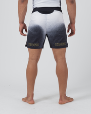 Kingz Galaxy Performance Series Shorts Black White - Full Body Back View Wide Stance Male Athlete Galaxy Gradient KINGZ Gold Text Both Legs Hem Level Side Splits Competition Cut Men's Grappling Shorts No-Gi BJJ