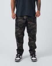 Kingz Casual Rip Stop Gi Pants - Camo - Front View Male Athlete Dark Camo Pattern Rip Stop Fabric Subtle Logo Right Thigh Relaxed Fit BJJ Gi Training Apparel [color:Dark/Camo]