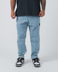 Kingz Casual Gi Pant Light Denim - Front View Male Athlete Light Denim Color Black Label Patch Right Thigh Relaxed Fit BJJ Gi Training [color:Light Denim]