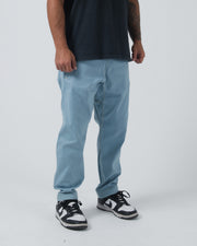 Kingz Casual Gi Pant Light Denim - Full Body Front View Male Athlete Light Denim Relaxed Fit Elastic Waistband Subtle Stitching Comfortable Design BJJ Gi Training Apparel [color:Light Denim]