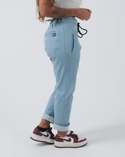 Kingz Casual Gi Pant Light Denim - Side View Female Athlete Elastic Waistband Black Drawstring Rolled Cuffs Crown Logo Back Pocket Relaxed Fit BJJ Gi Training Apparel [color:Light Denim]