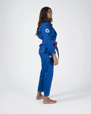 Kingz Classic 3.0 Women's BJJ Gi Blue - Full Body 3/4 Side Back View Female Athlete Purple Belt Crown Badge Logo Women's