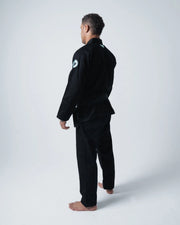 Kingz Classic 3.0 BJJ Gi Black - 3/4 Angle View Side Upper Body Detail Crown Shield Patch