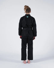 Kingz Classic 3.0 Women's BJJ Gi Black - Full Body Back View Female Athlete Black Belt Teal Crown Logo Upper Back Women's