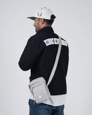 Kingz Side Bag Cream - Male Back View Lifestyle - Cream Crossbody at Hip from Behind - BJJ Training Bag