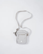 Kingz Side Bag Cream - Angled Overhead View - Strap Curving from Above Crown Logo Visible BJJ Bag