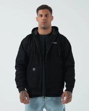 Kingz Canvas Jacket Black - Full Body Front View Male Athlete Black Zip-Up Hoodie KINGZ Chest Logo Crown Badge Sleeve Casual Streetwear [color:Black]