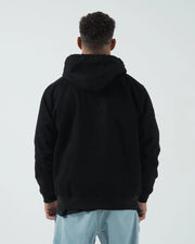 Kingz Canvas Jacket Black - Back View Male Model Black Hooded Design Relaxed Fit Streetwear [color:Black]