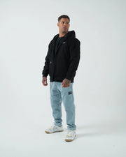 Kingz Canvas Jacket Black - Full Body Front View Male Athlete Black Hooded Jacket Subtle KINGZ Chest Logo Casual Streetwear Design [color:Black]