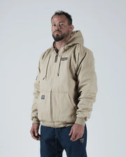 Kingz Canvas Jacket Tan - Front View Male Model Hooded Design KINGZ Chest Logo Front Pockets Ribbed Cuffs Relaxed Fit Streetwear [color:Tan]