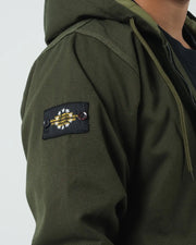 Kingz Canvas Jacket Military Green - Close-Up Side View Hooded Design Black Patch Text Detail Durable Fabric Streetwear [color:Black]