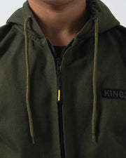 Kingz Canvas Jacket Military Green - Close-Up Front View Drawstring Hood Black KINGZ Patch Zipper Detail Yellow Accent Streetwear [color:Black]