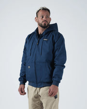 Kingz Canvas Jacket Navy Blue - Front View Male Model Hooded Design KINGZ Chest Logo Dual Front Pockets Ribbed Cuffs and Hem Streetwear [color:Navy Blue]