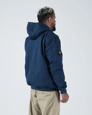 Kingz Canvas Jacket Navy Blue - Back View Male Model Hooded Design Black Logo Patch Left Sleeve Streetwear Casual Apparel [color:Navy Blue]