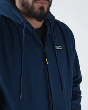 Kingz Canvas Jacket Navy Blue - Close-Up Front View Male Athlete Drawstring Hood KINGZ Chest Logo Zippered Front Streetwear [color:Navy Blue]