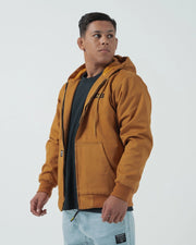 Kingz Canvas Jacket Desert - Three-Quarter View Male Model Mustard Yellow Hooded Design Black KINGZ Chest Logo Front Pockets Casual Fit Streetwear [color:Desert]